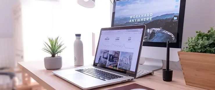 Work desk with laptop and monitor