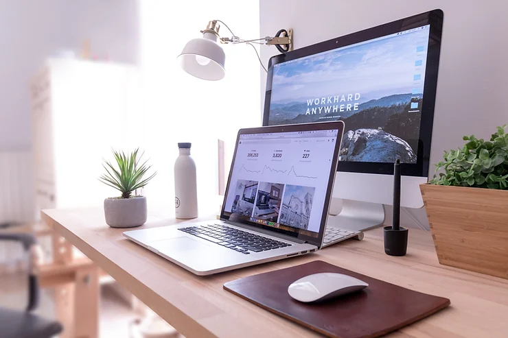 Work desk with laptop and monitor