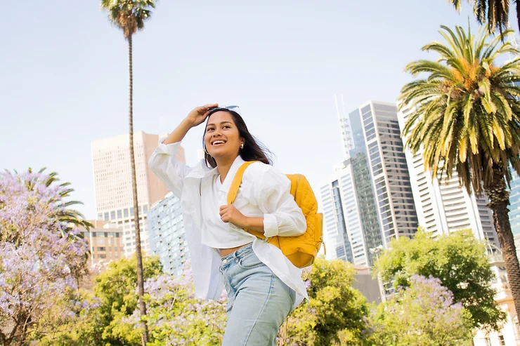 Student with backpack outdoors